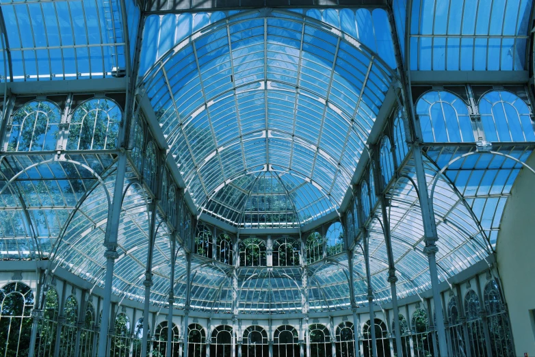 there is a large glass and glass ceiling in the building