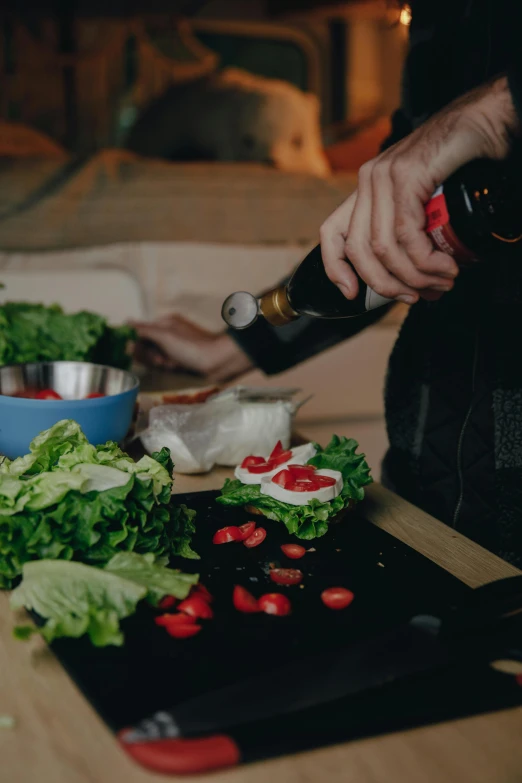 the chef is slicing up lettuce with a sharp knife