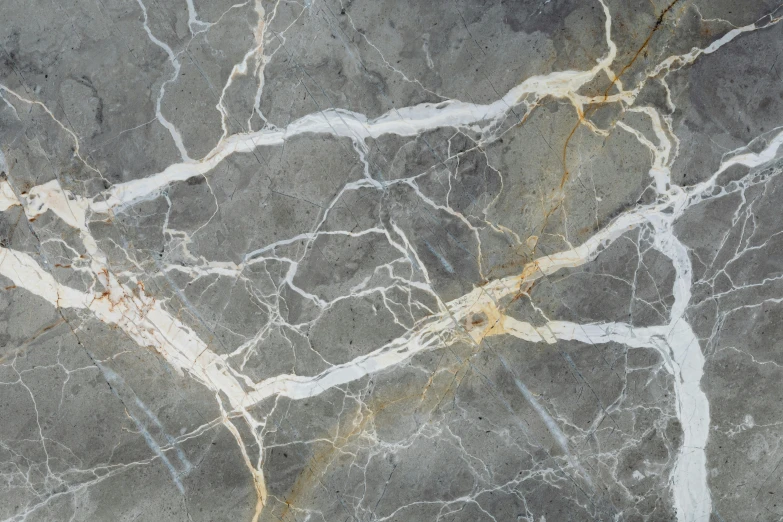 the top view of a granite slab with yellow lines