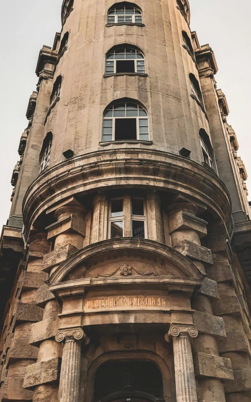 the entrance to the stone tower building is shown