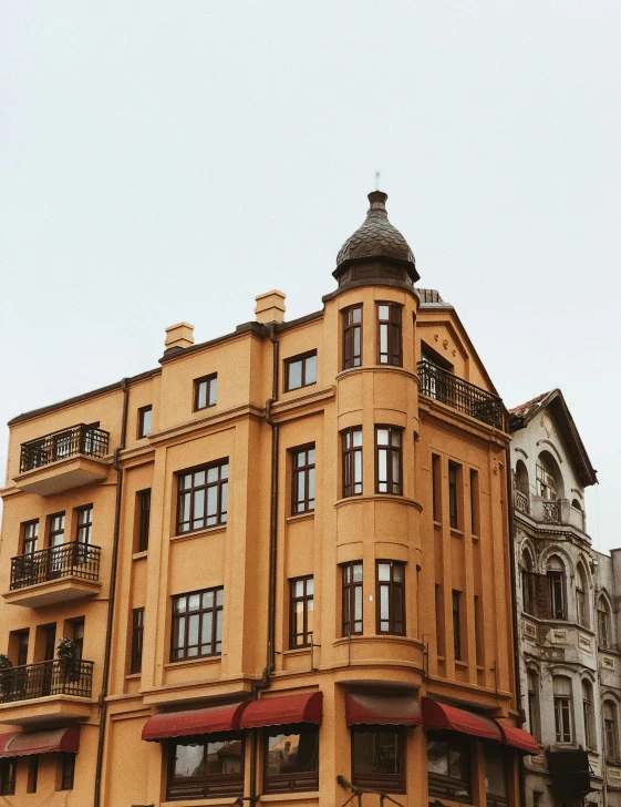 there is an old building with some shutters on the top