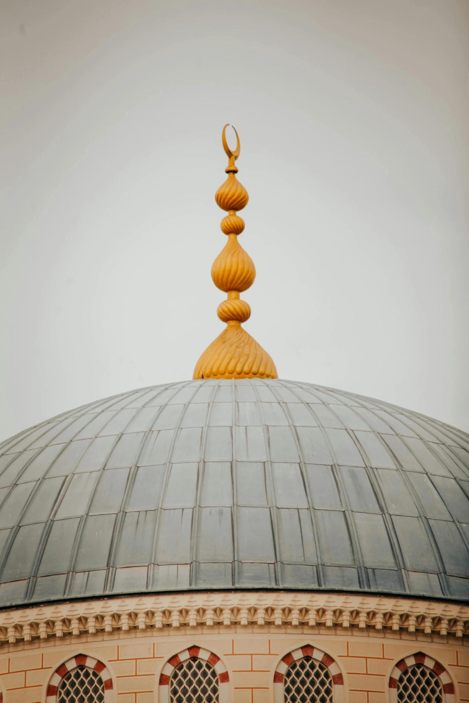 a dome has a golden ring on it