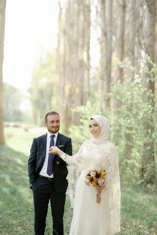 a couple is standing together at the wedding