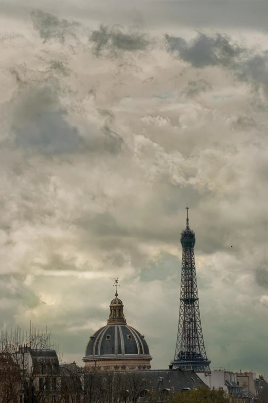 the eiffel tower has been very tall and is surrounded by trees