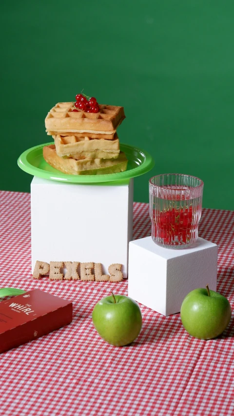 a green plate filled with food and fruit