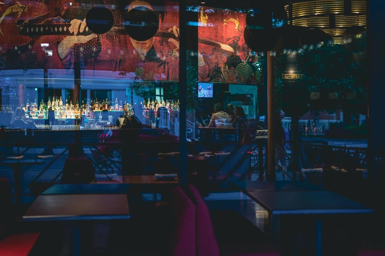 an empty restaurant that looks very dark