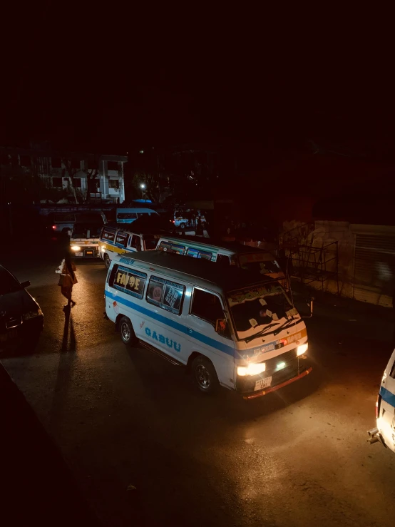 a van parked next to another van on a parking lot