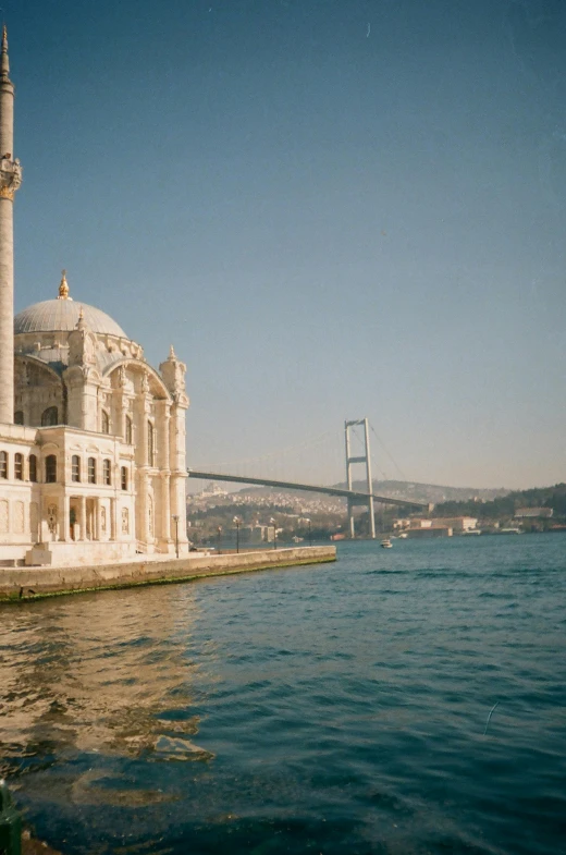 a large, white building with an impressively detailed roof