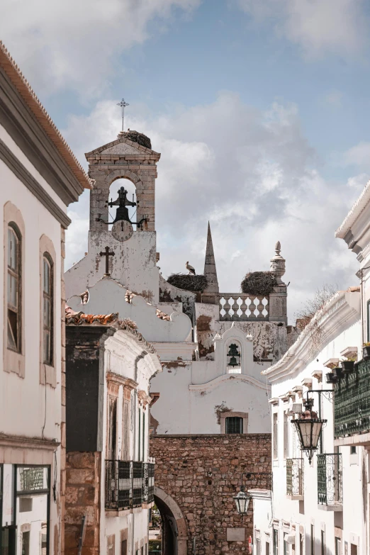 a street with a church on it and old buildings