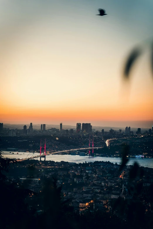 the skyline with boats at dusk in a large bay