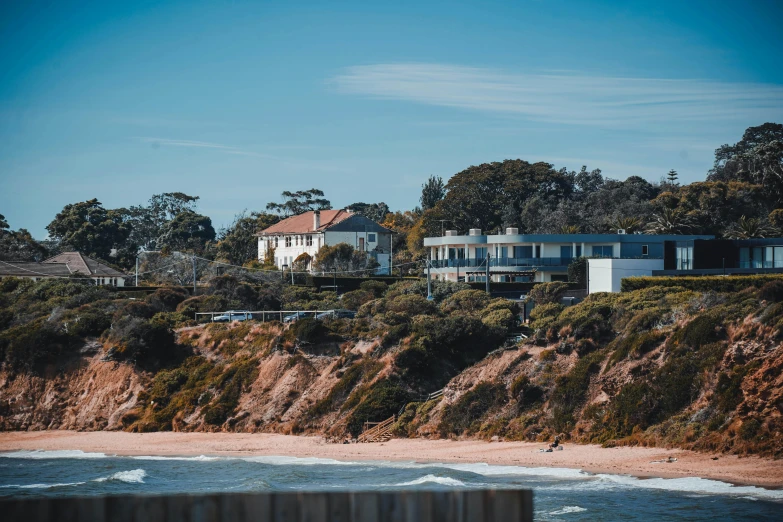 this beautiful home is on top of a cliff