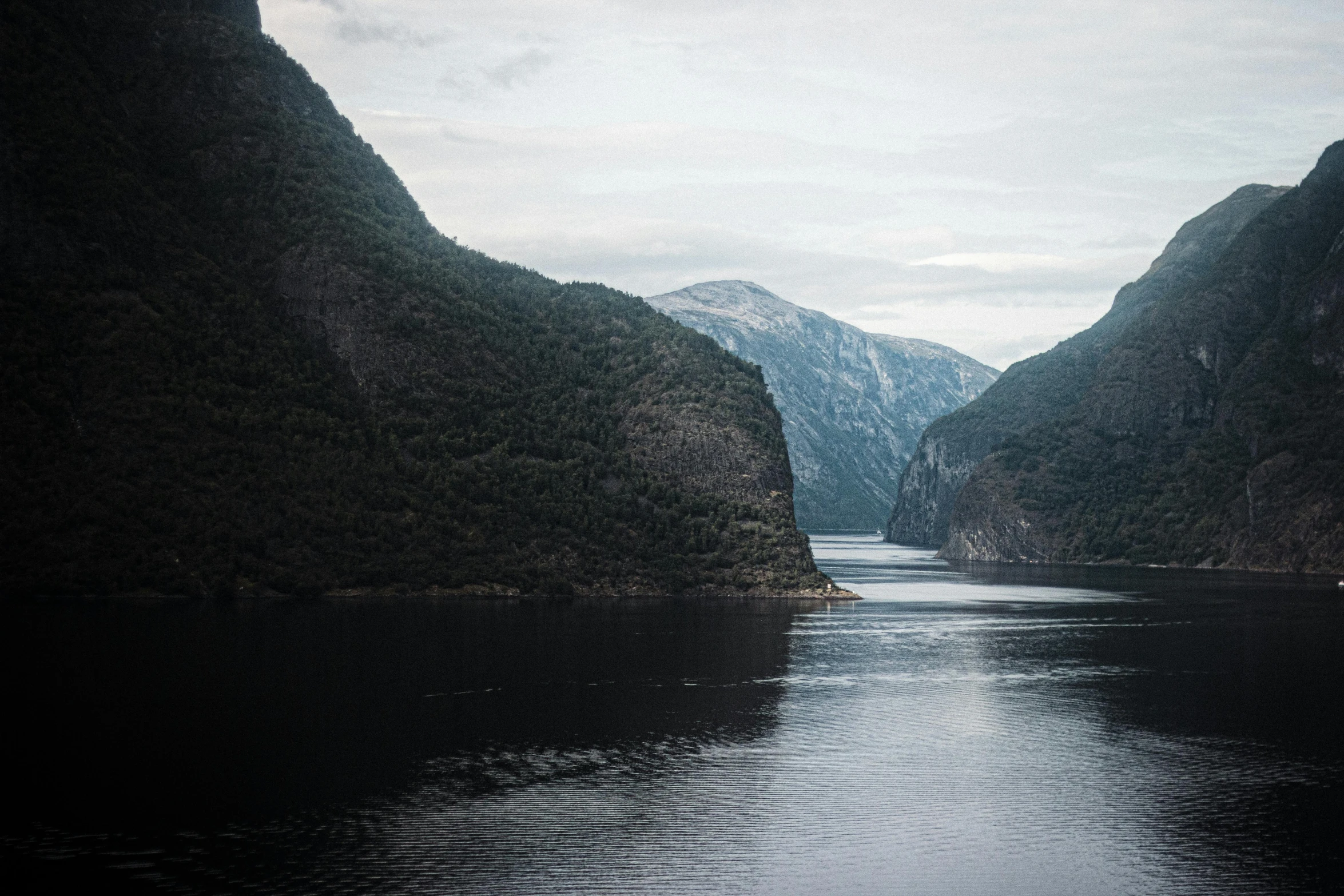 two very long mountains in the middle of water