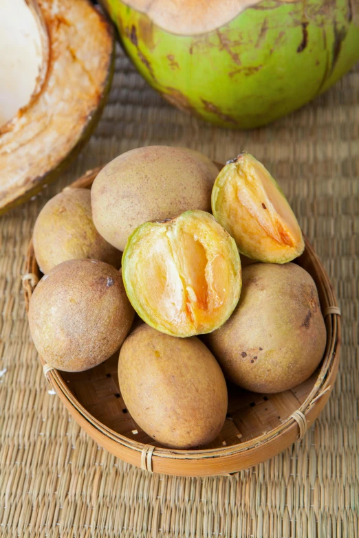 a basket that has some kind of fruit in it