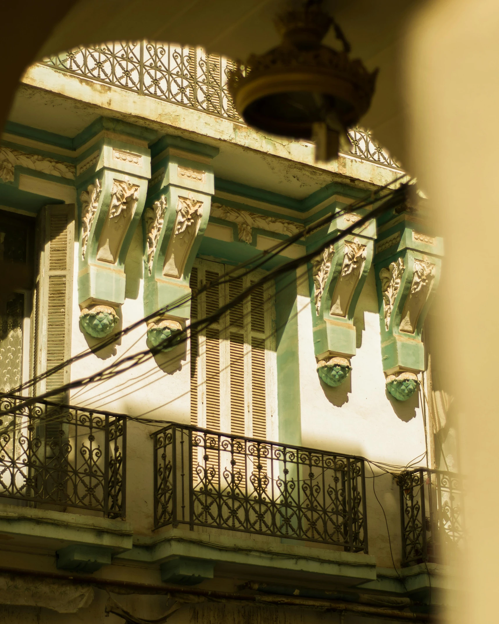 a balcony with ornate balconies and balcony rails