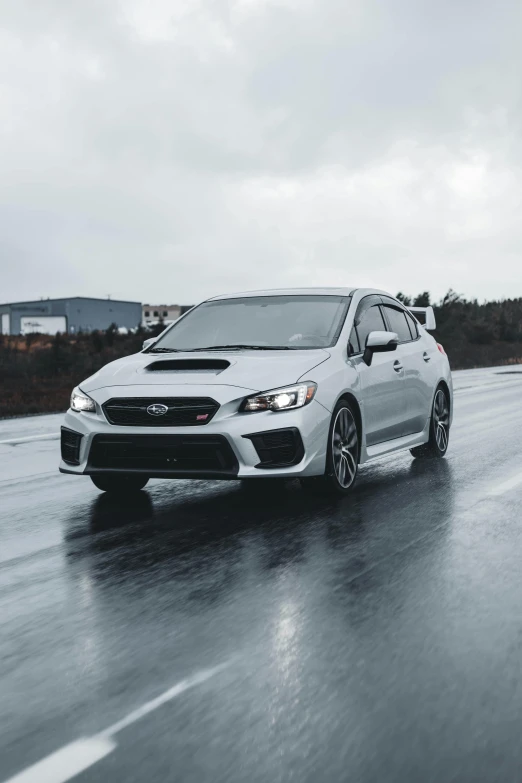 the 2018 subarub on the road in the rain