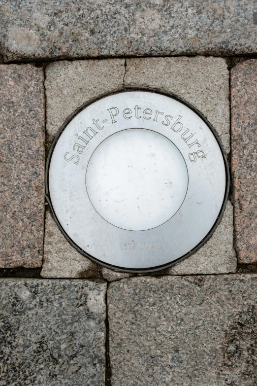 the sign for the memorial is written on the pavement