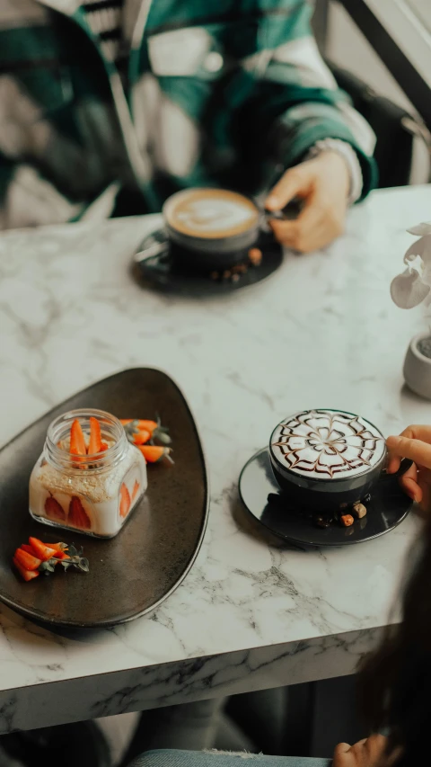 a close up of two plates with cake on them