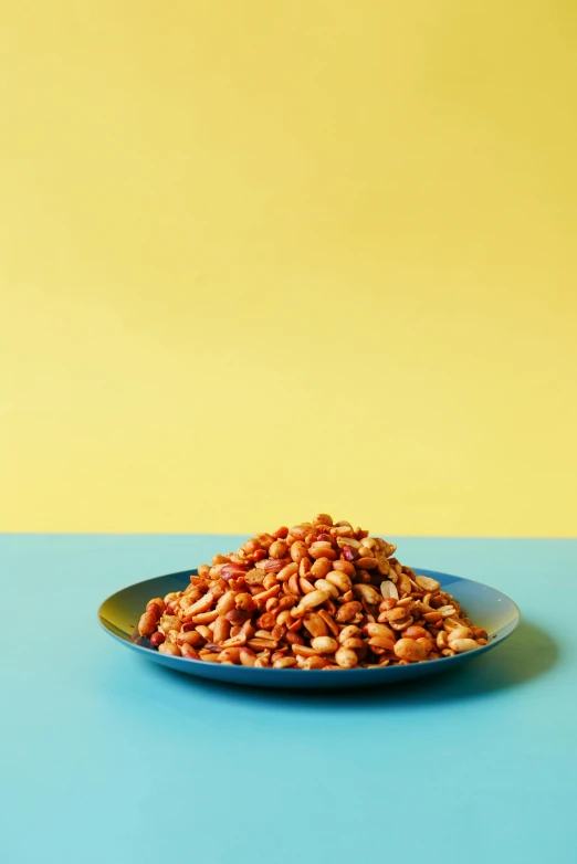 a bowl of nuts sitting on top of a table