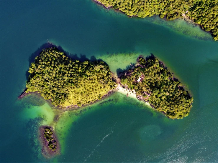 an aerial view of a small island in the ocean