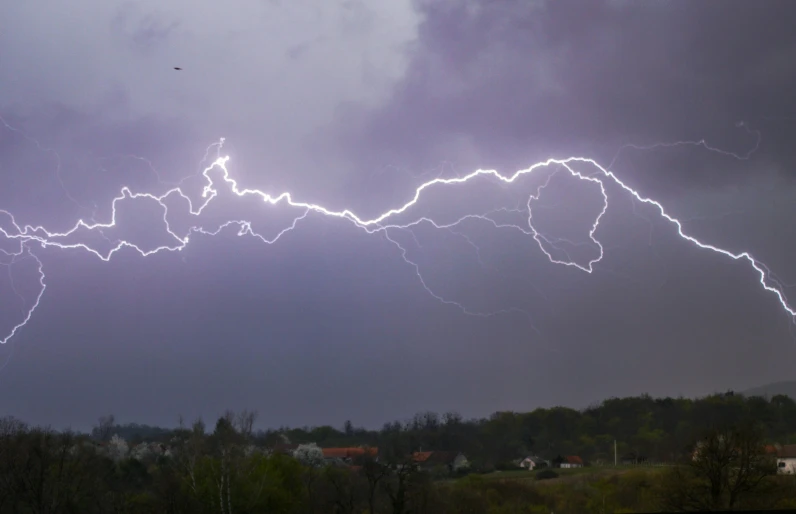 an image of storm hitting with lightning coming