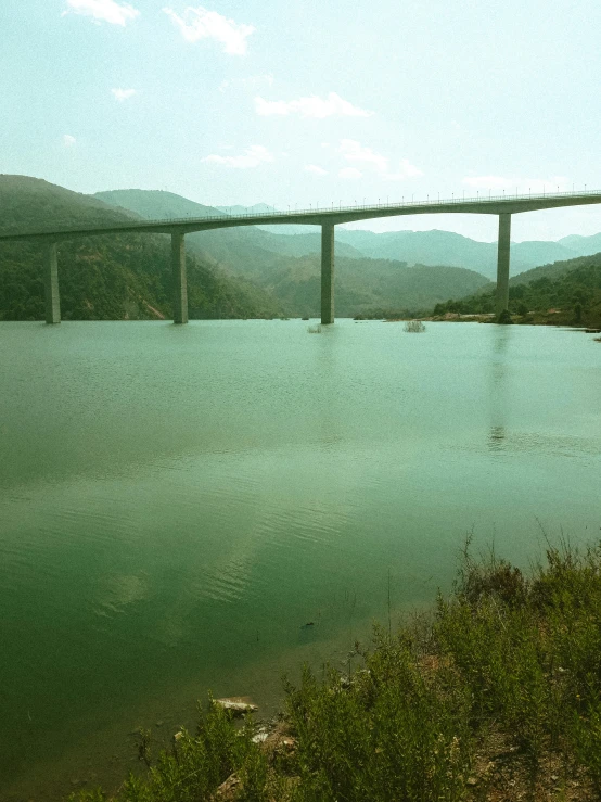 an image of a bridge that is in the sky