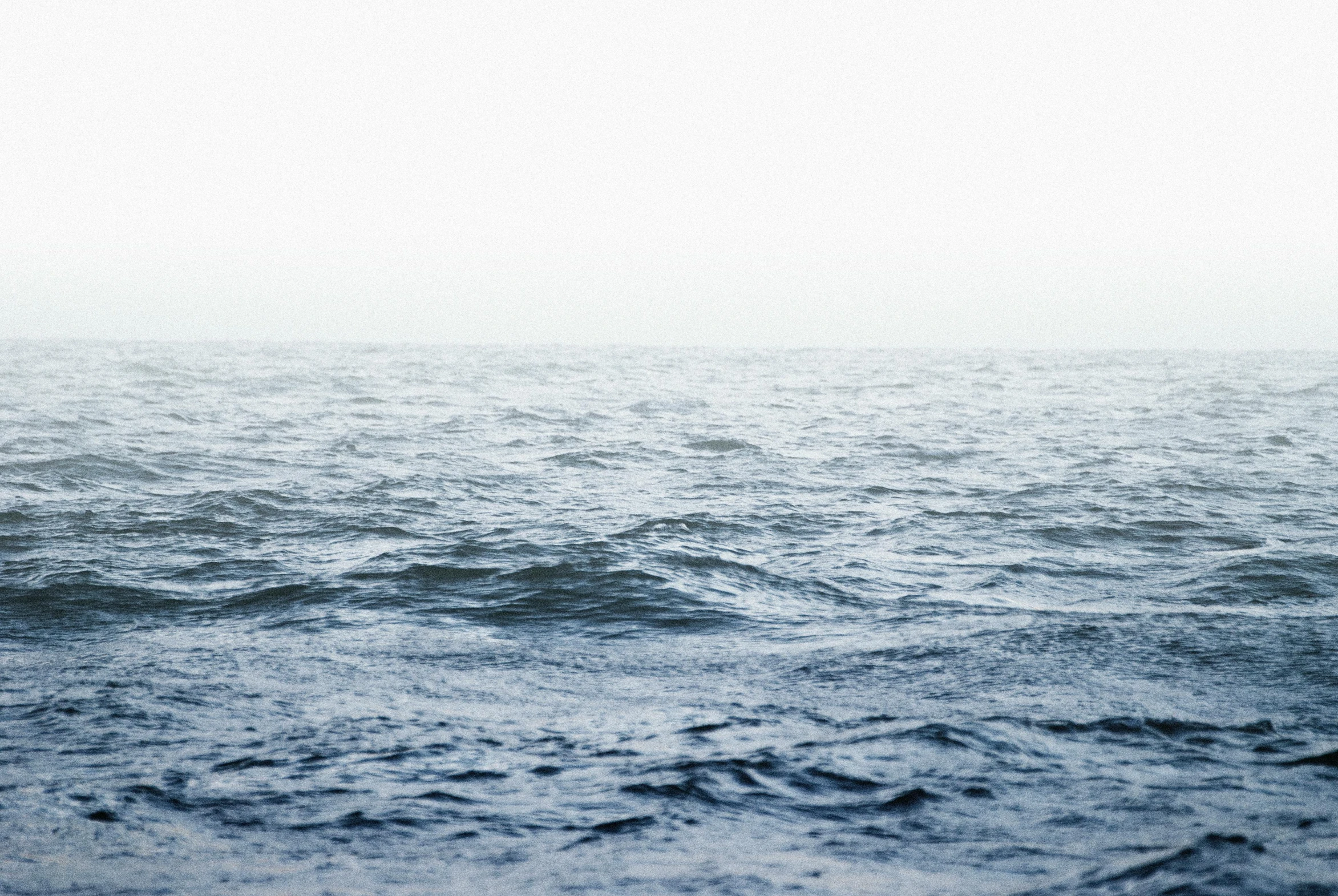 the large body of water is covered in grey