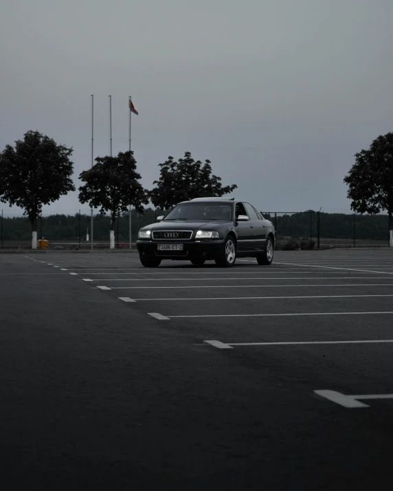 black and white po of an suv parked in a lot