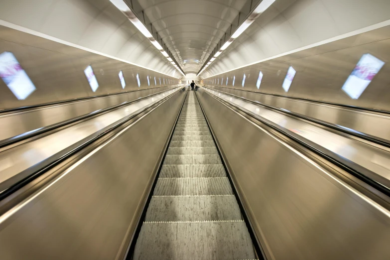 a close up of a metal ramp in an airplane