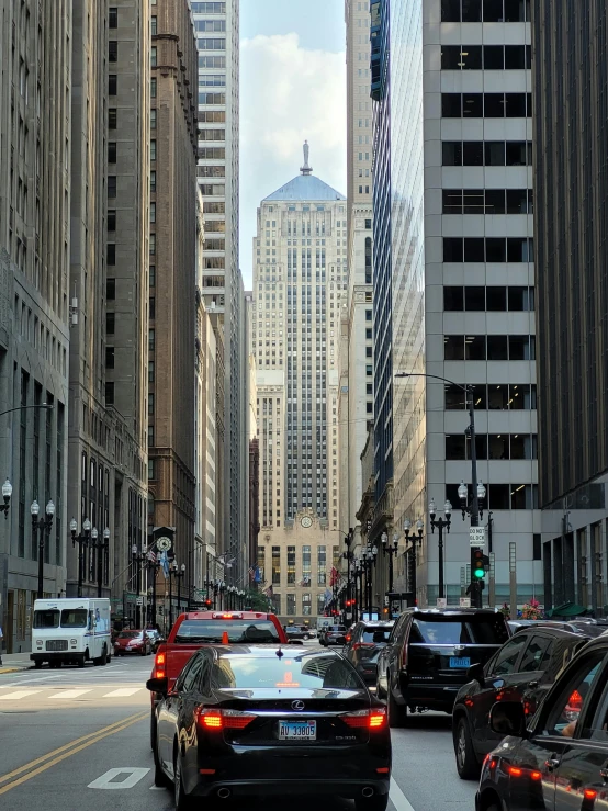 an image of a city street full of traffic