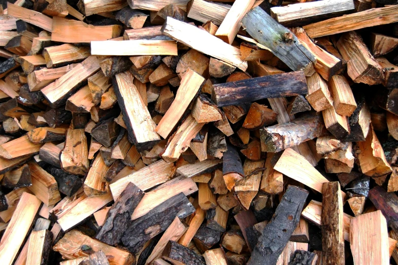 a pile of wood chopped up and ready to use