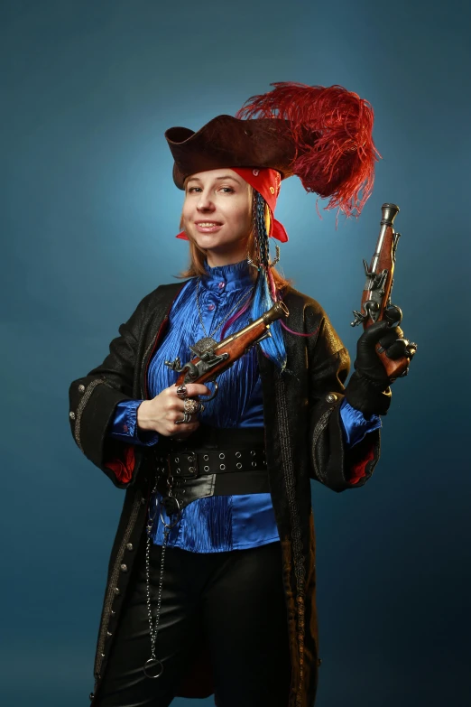 a young lady wearing a red hair and a pirate costume