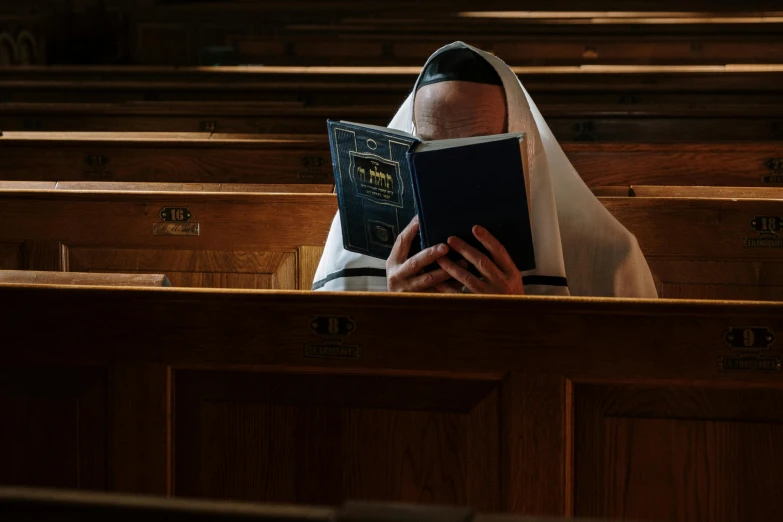 a person with a priest robes in church
