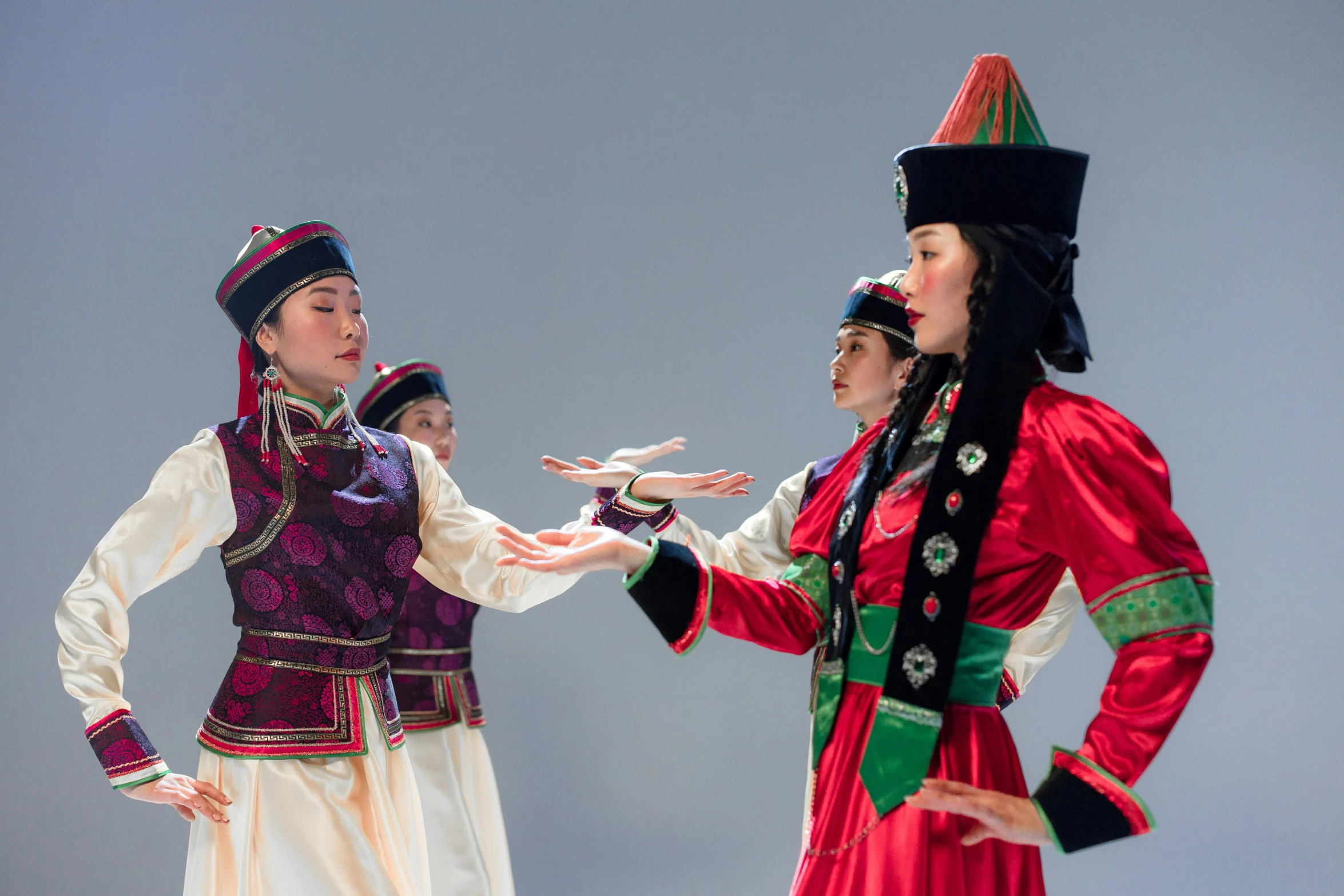 a couple of women are dressed in costume