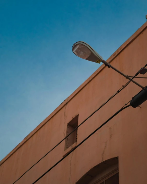 a tall light on a city street