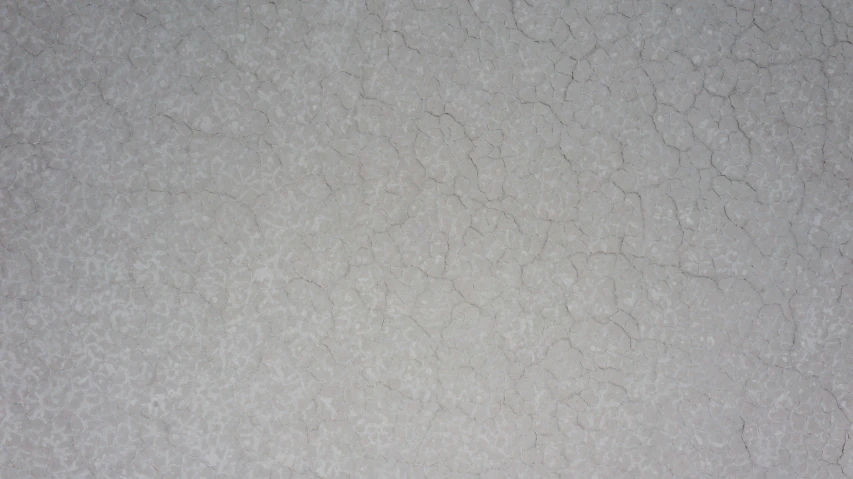 an image of textured cement background with dirt marks