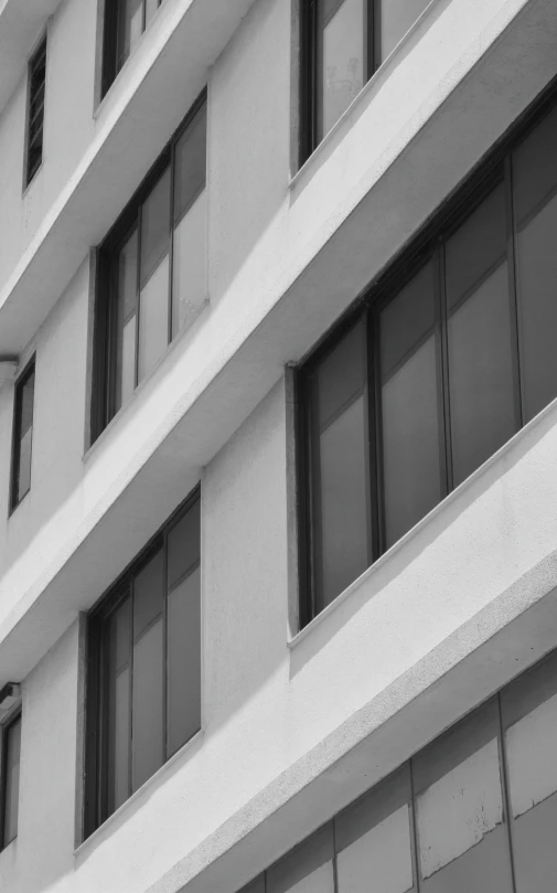 a large white building with many windows