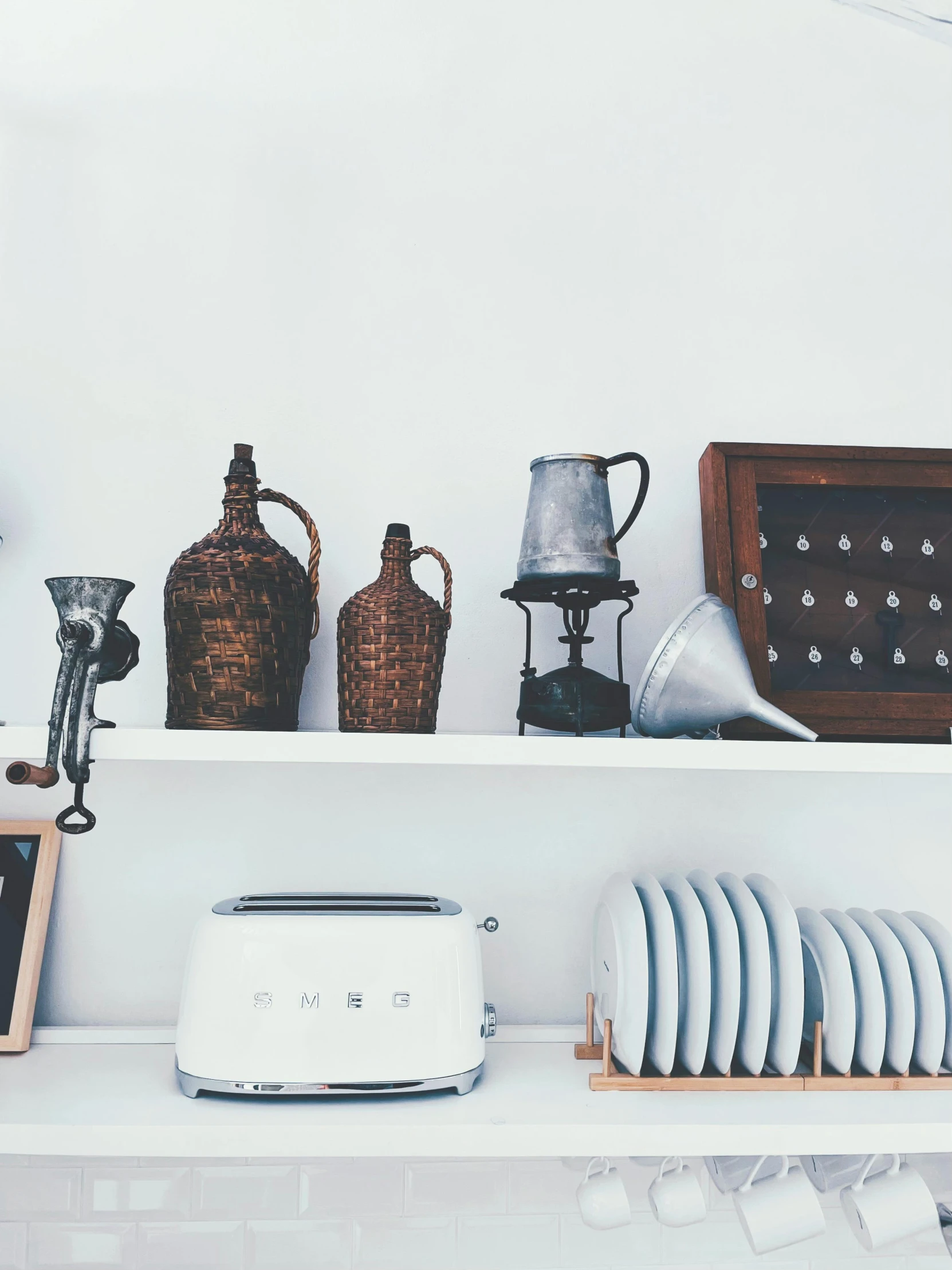 a shelf is full of toasters and a toaster