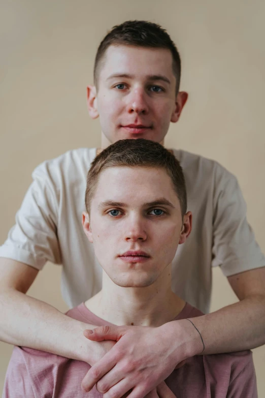 two men are looking at the camera