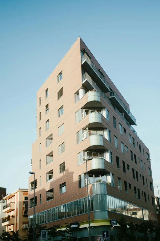 a modern apartment building in a city square