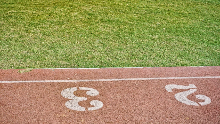 a baseball field with number three painted on it
