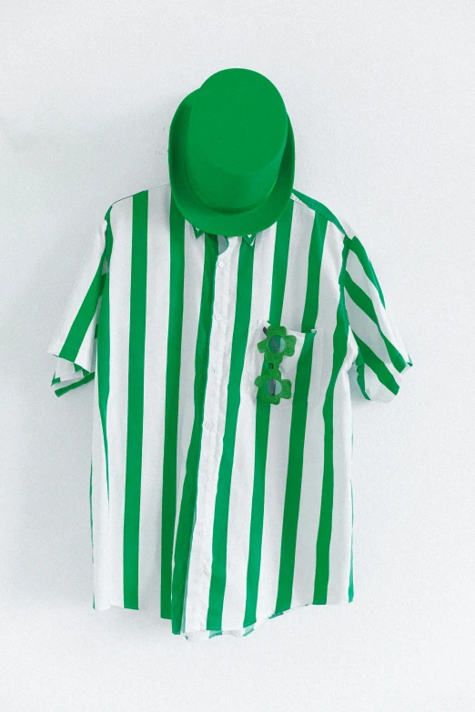 green and white striped shirt with a large on