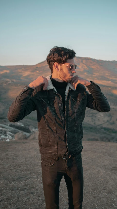 a man that is standing in the dirt