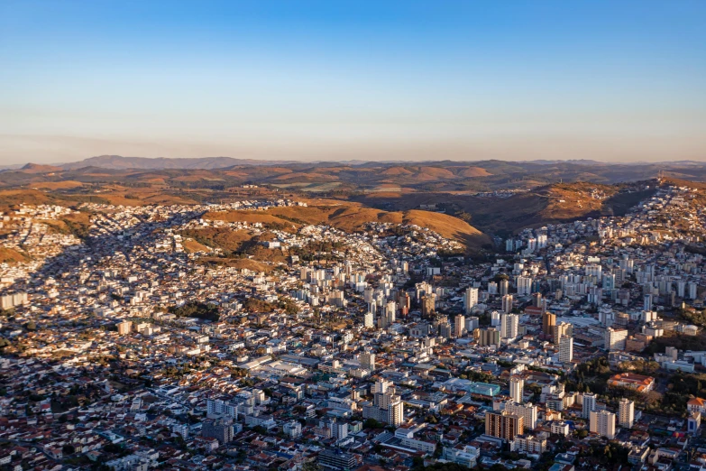 an aerial view of a city from the top of a tall building