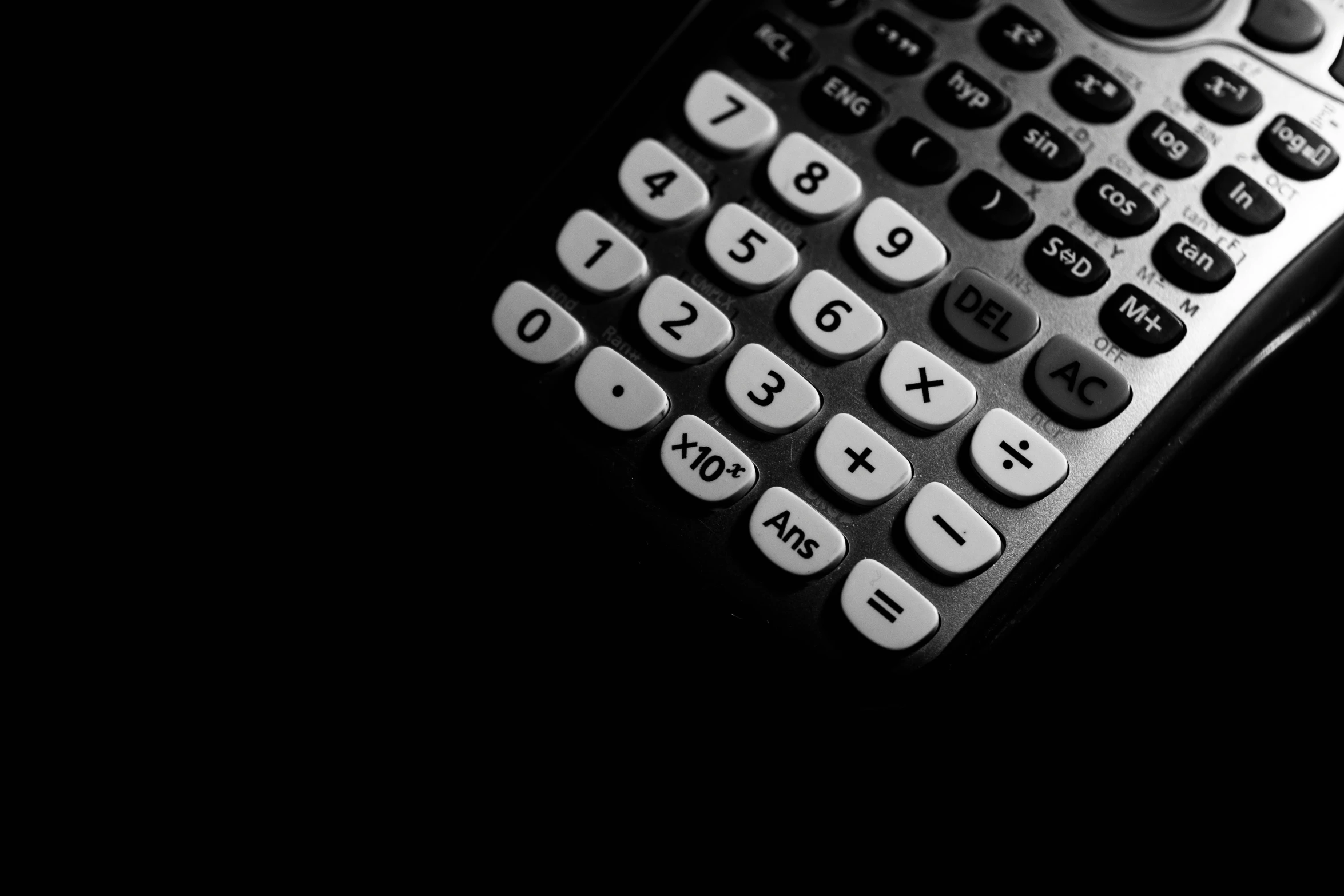 a black and white image of a calculator