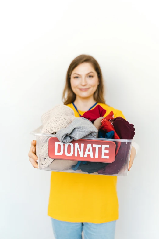 a woman with a hand bag full of items