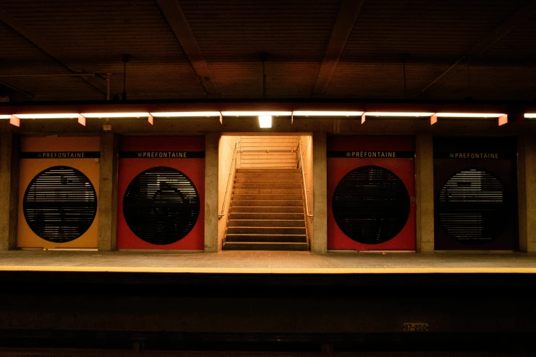 a theatre is set with four speakers and a staircase