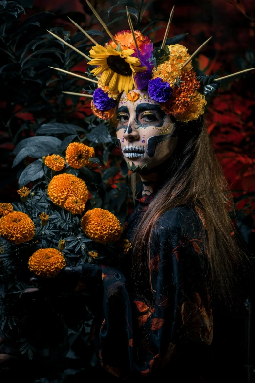 there is a woman with face paint and flowers