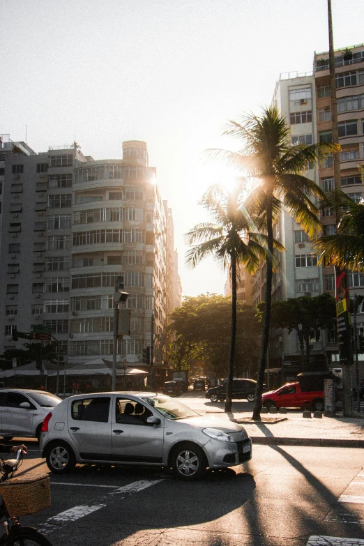 a busy city street with lots of tall buildings