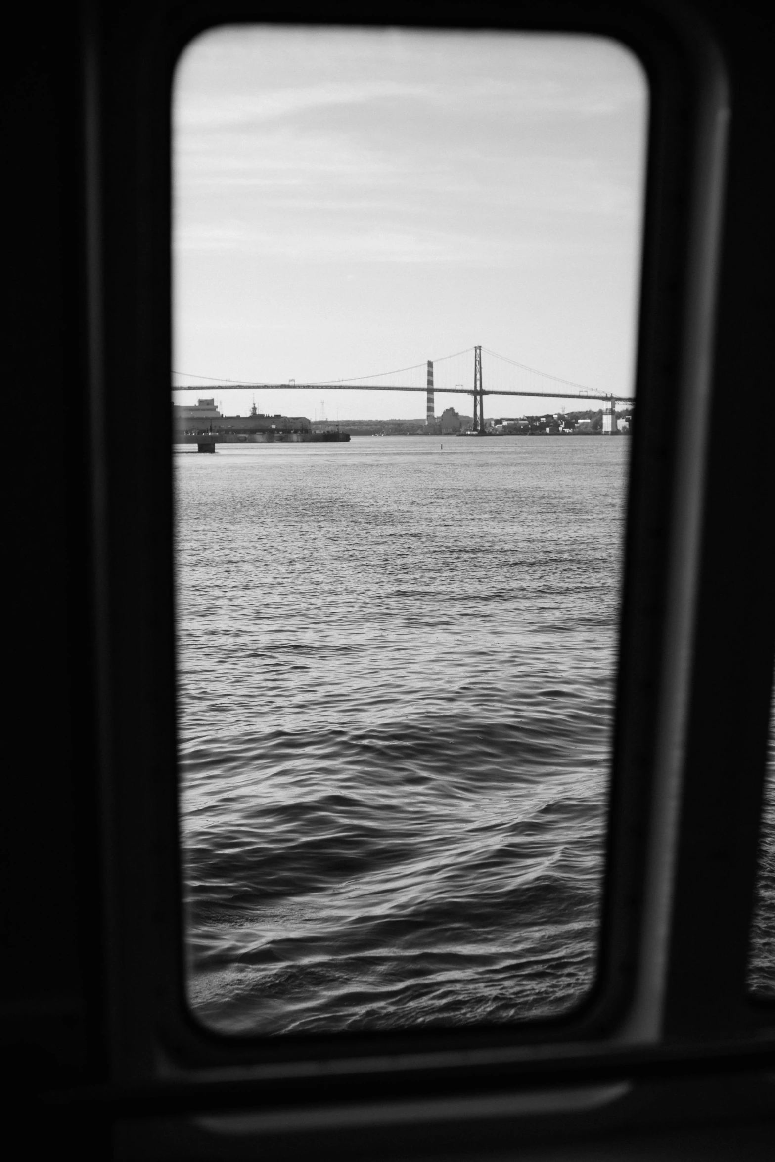 a view of the bridge from a passenger boat