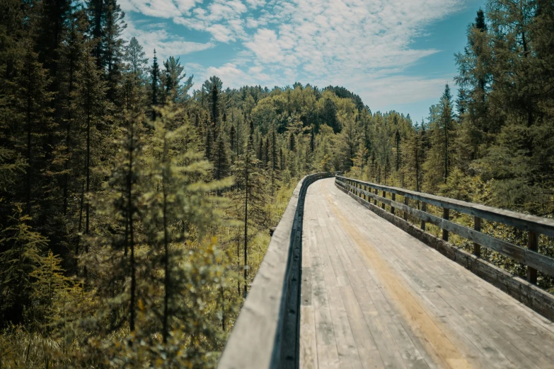 the view from inside the car of a road bridge